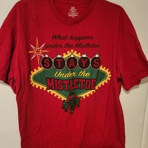 Distressed Christmas T WHAT HAPPENS UNDER THE MISTLETOE STAYS UNDER THE …